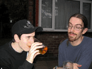 Fez and John discuss the strange fellow with a camera